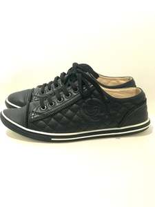Frontpage: Chanel Black Leather Sneakers