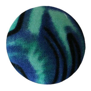 Blue paua badge