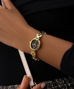 Guess Jewellery: Guess Watch Vivian Black with Gold Bracelet
