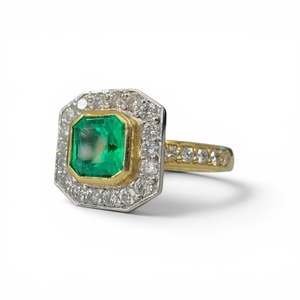 Products: Emerald and Diamond Cluster Ring