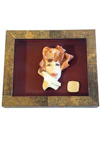 Funky framed clay portrait