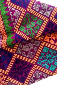 Vibrant colourful embroidered fabric