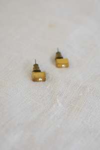 Under 20: Golden cuboid stud earrings