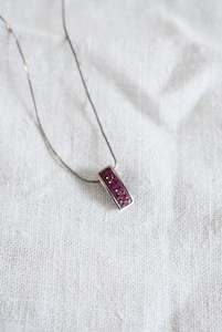 Under 20: Pink sparkly pendant on silver chain