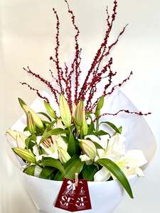 Bouquets: Christmas Lily Bouquet with Red Berries