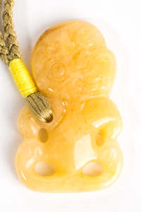 Hei Tiki Jewellery Nz: Hei Tiki Yellow Jade Gemstone Pendant on handwoven natural strand.