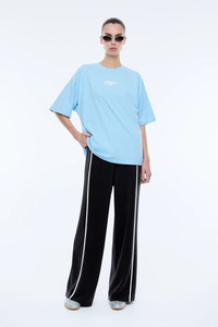 Ena Pelly: Ena Pelly 1984 Tee - Light Blue