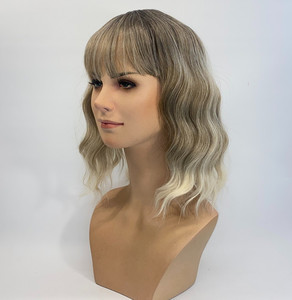 Products: Ash brown with blond tips Sole Wig Works