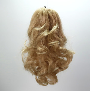 Products: Banana clip volumizer Sole Wig Works