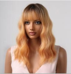 Pale orange with dark roots Sole Wig Works