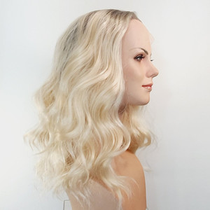 Blond and wavey with ash roots Sole Wig Works