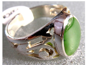 Products: Oval Koru Greenstone Ring SomethingKiwi