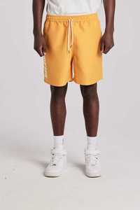 Pants Shorts: Huffer Staple Trunk/Italic in Mango