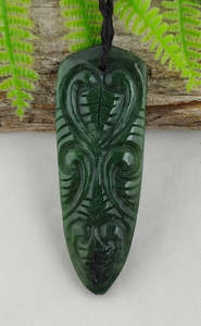NZ Greenstone Tongue With Koru Design #48