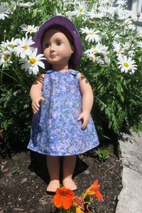 Products: Doll dress and sunhat, purple, fits 46cm doll