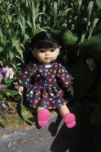 Products: Dress and hat set, black with coloured hearts, fits 38cm Miniland dolls