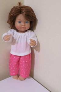 Products: Pants and shirt, pink, fits 30cm doll