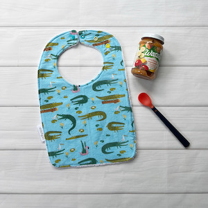 Products: Feeding Bib – Crocodiles – StitchGirl