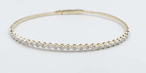 Gold Bracelets: 10K Gold Lab Diamond set Flex Bangle with clasp 0.80ct
