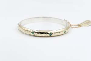 Gold Bracelets: 9ct Gold on Silver Bangle with 3 Emerald
