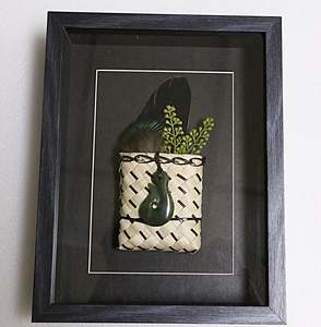 Maori Arts: Framed New Zealand Greenstone Fish Hook with Feathers & Kete