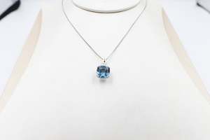 Gold Pendents: 9ct White Gold Blue Topaz and Diamond Pendent 28660A
