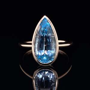 Coloured Gem Rings: 4.5ct Pear Blue Topaz