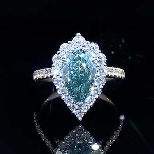 Diamond Rings: Pear Teal Diamond Halo Ring