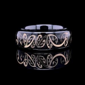 The Midnight Golden Koru Ring