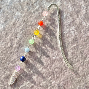 Products: Chakra bookmark with feather charm Strength Within