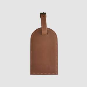 Bag Accessories: Luggage Tag in Tan (112 mm x 74 mm). Duffle&Co embossed.