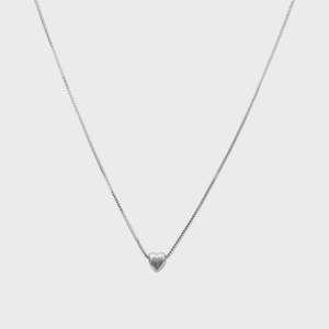 Necklaces 1: THE HEART SERIES PETITE HEART NECKLACE