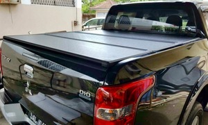 Products: Mitsubishi Triton (2015-2023) Tri-Fold Tonneau Cover