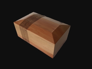 Products: Wood Dog Urn - Maori Design Koru - Swiss Wood Technician