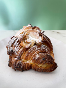 Products: Almond Croissant Take a Bite