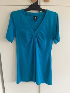 Products: Turquoise V-neck tee