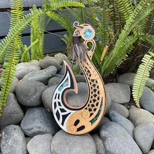 Rakau Wood: Hei Matau Wall hanging