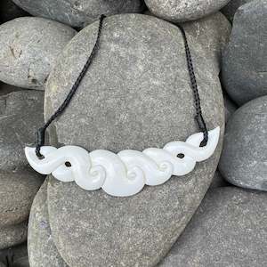 Taonga Jewellery: Koru Breastplate