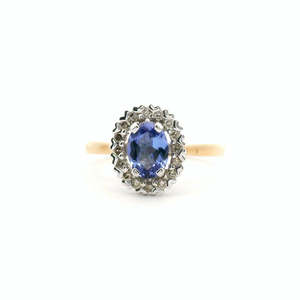 Coloured Stone Engagement Ring: Sapphire & Diamond 9ct Yellow Gold 0.79ct Oval Ceylon Sapphire & 0.18ct Round Brilliant Diamond Halo Cluster Ring