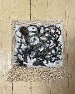 Objects: Small woven artwork