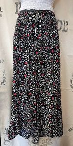 Skirts: Black Skirt With Mini Floral Print.