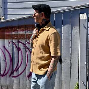 Button through polo in checkerboard knit - Sand