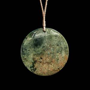 Necklaces: Handcarved Jade disc by Alex Sands