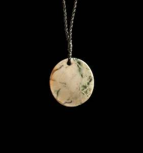 Jade disc pendant by Nick and Mady