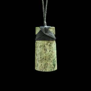 Jade Toki hand carved pendant by Nick and Mady