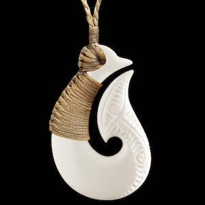 Specials: Bound Engraved Matau, handcrafted bone pendant