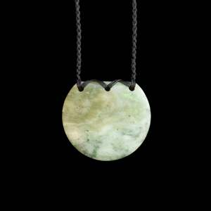 Jade disc pendant by Nick and Mady