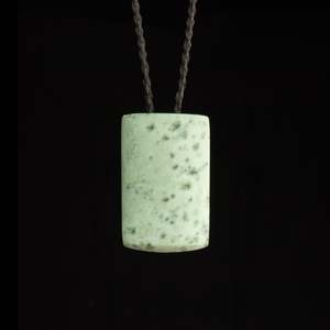 Toki Adze: Hand carved Hei Toki jade pendant by Nick and Mady