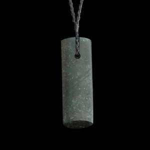 Hand carved Hei Toki jade pendant by Nick and Mady