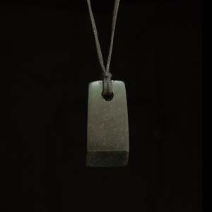 Hand carved Hei Toki bowenite pendant by Nick and Mady